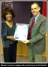 Presented a plaque after the "I Am Domestic Violence" show and workshop at Fort Detrick in Frederick, Maryland.-October 5, 2011