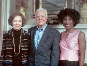 Wambui is with President and Mrs. Carter in Georgia after her performance at the Carter Center. -- April 13, 2002